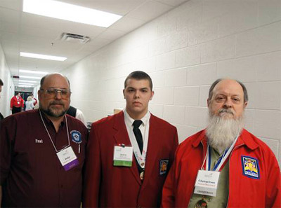 Photo 6. Motor Control Gold Medal. Paul Linger and Jim Williams proudly present the Gold Medalist for the motor control section of SkillsUSA WV.