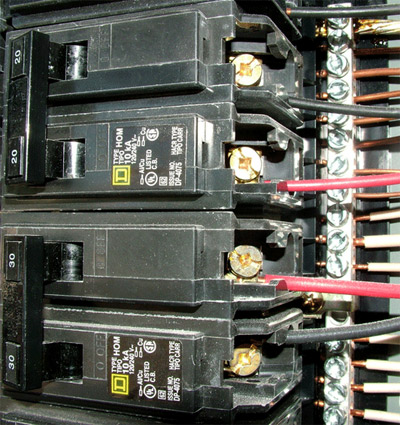 Photo 1. A multi-wire circuit connected to a common trip breaker which will provide simultaneous disconnection