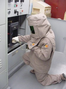 Photo 5. Your first choice should always be to work de-energized. If you must work energized, wear your approved personal protective equipment (PPE). This person is prepared should a problem occur.