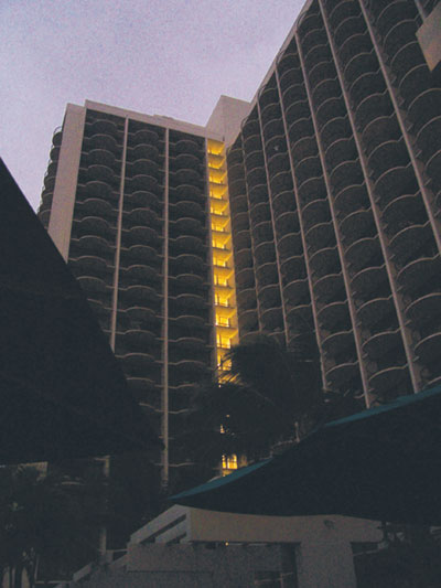 Photo 1. This photo was taken by Mark Hilbert after an earthquake in Hawaii. The entire island was without power because the utility generators sensed the movement and shut down. The only thing illuminated in the entire hotel was the stair tower. 