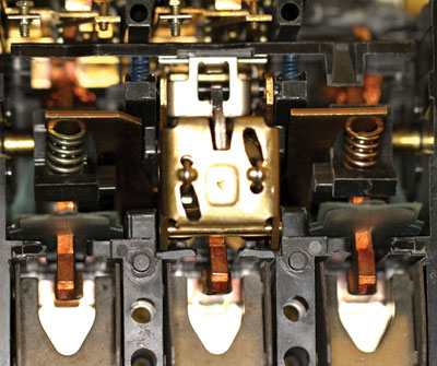 Photo 4. This photo shows the inside of a breaker. You can see some of the mechanical parts that are required for proper operation.