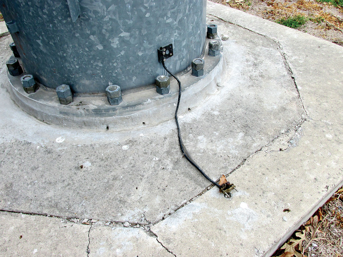 Photo 3: Wind tower base showing a connection to a ground rod. Note: check the construction of the foundation as this may also qualify as a grounding electrode.
