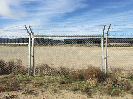 Photo 10. Isolated fencing (section 1 of 3) using insulators and PVC supports in concrete (not shown)