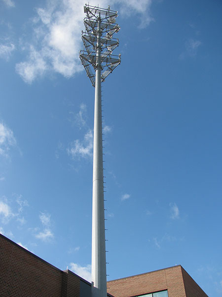 Figure 7. The COMTEC center’s transmission tower was grounded when built, but age and corrosion had deteriorated the connections. Upgrades during restoration of the center included exothermically welded connections, new grounding electrodes and a buried copper ring ground.