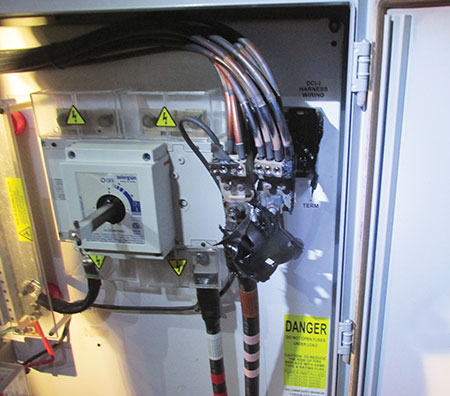 Photo 4. A 400-amp DC combiner discovered during nighttime inspection experiencing a thermal event due to loose terminations. The GFP at the inverter never tripped, and there was no indication at the control building this was occurring.