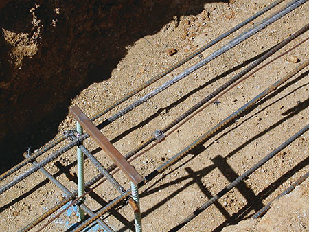 Photo 1. Array grounding electrode required. A 2 AWG copper conductor attached to a rebar to make a concrete-encased electrode (sometimes referred to as UFER)—prior to concrete pour.