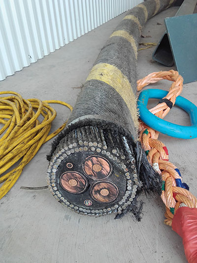 Photo 3. An end view of the specialized 34.5 kV sub-marine cable used.