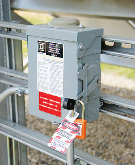 Photo 1. Lockout and tagout gear is readily available for different types of switches and breakers. Always put your name and contact information on the tag, so others know who is responsible for the lockout.