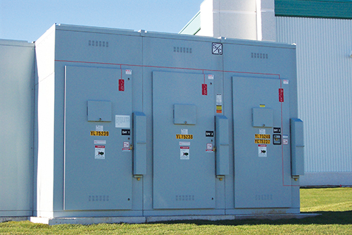 Photo 11. A tamper-resistant high voltage switchgear, note the covers over the viewing windows in each door.