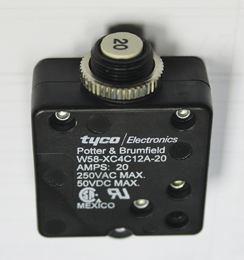 Photo 11. A Tyco Electronics supplementary protector, with two recognition marks on the side of the device. The markings do not indicate the application code for this supplementary protector. Looking at the certification record on line the Application Code is C1.