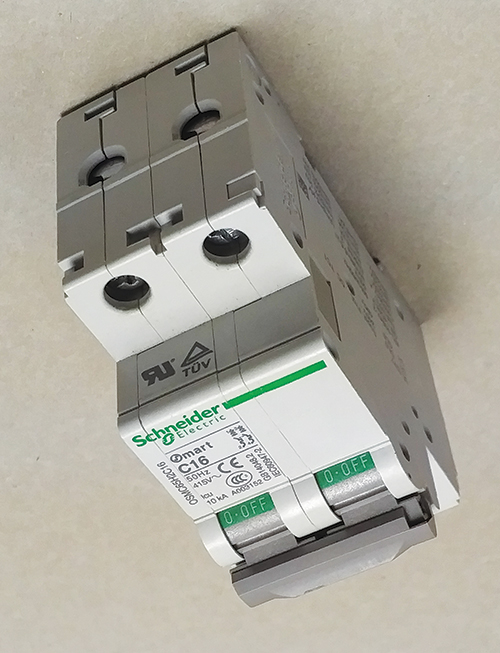 Photo 6. A Schneider Electric supplementary protector, note the location of the recognition mark on the end of the device. The marking on the side indicated an Application Code of U1