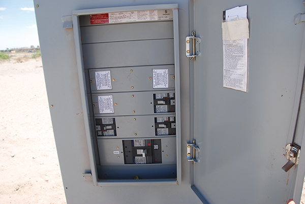 Photo 8. Oops, the electrician got it wrong. The three backfed PV breakers should have been mounted at the top of the panel as far as possible from the main breaker located at the bottom.