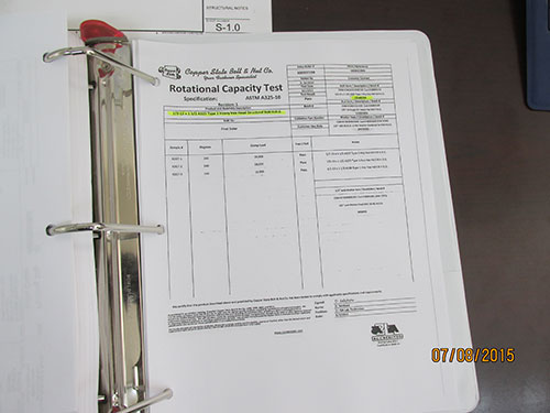 Photo 9H. All documentation for high-strength steel, bolts, nuts, washers, and galvanization are kept in binders. In this example, since this was a galvanized A-325 bolt, F436 washer and a lubricated nut (A563), the assembly shall conform to the rotational capacity testing required by ASTM-A325-10. Look for this and other documentation.