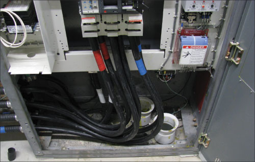 Photo 10. A single conductor cable installation where the maximum continuous loading allowed by Rule 8-104(5) that is less than the continuous marking on the circuit breaker, and that will require the caution marking in accordance with Rule 2-100(4).