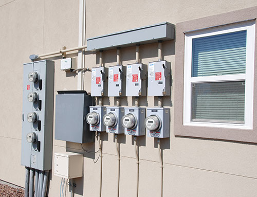 Photo 1. Four, supply-side PV system connections on a 4-plex condominium.