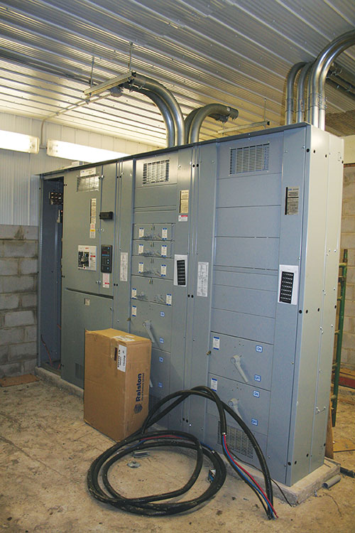 Photo 1: A 2000A 600V distribution panel during construction, that is required by CE Code Rule 14-102 to have ground fault protection.