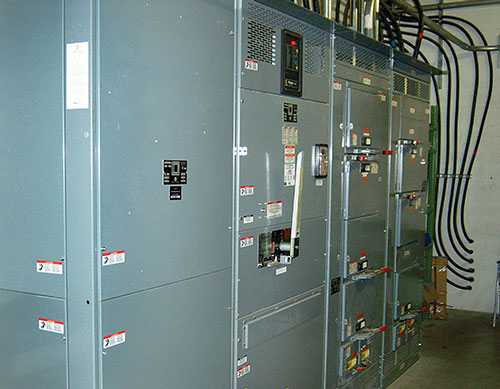 Photo 3: A 2000A 208V distribution panel during construction, that is required by CE Code Rule 14-102 to have ground fault protection.