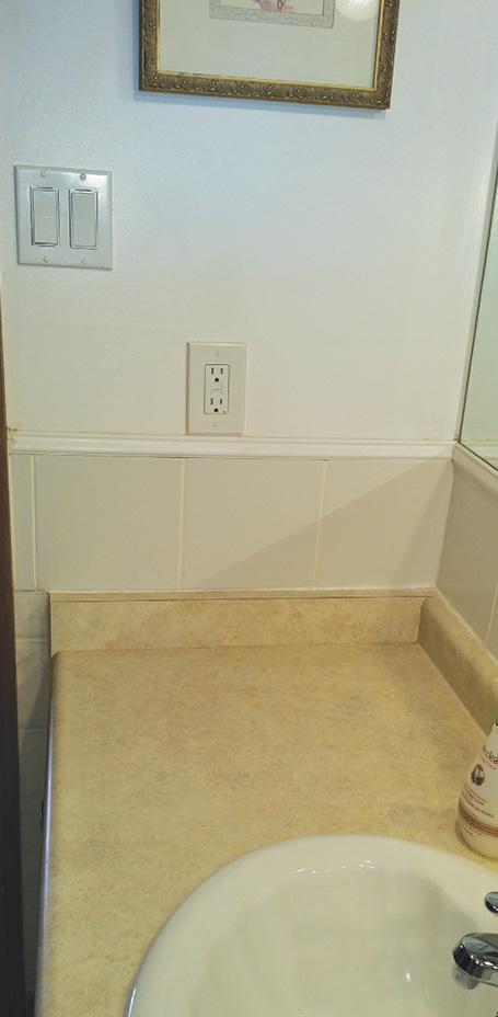 Photo 4.  The washroom receptacle shown is not required to be on a circuit that has arc-fault protection unless the branch circuit also feeds receptacle located beyond 1 m from a wash basin.