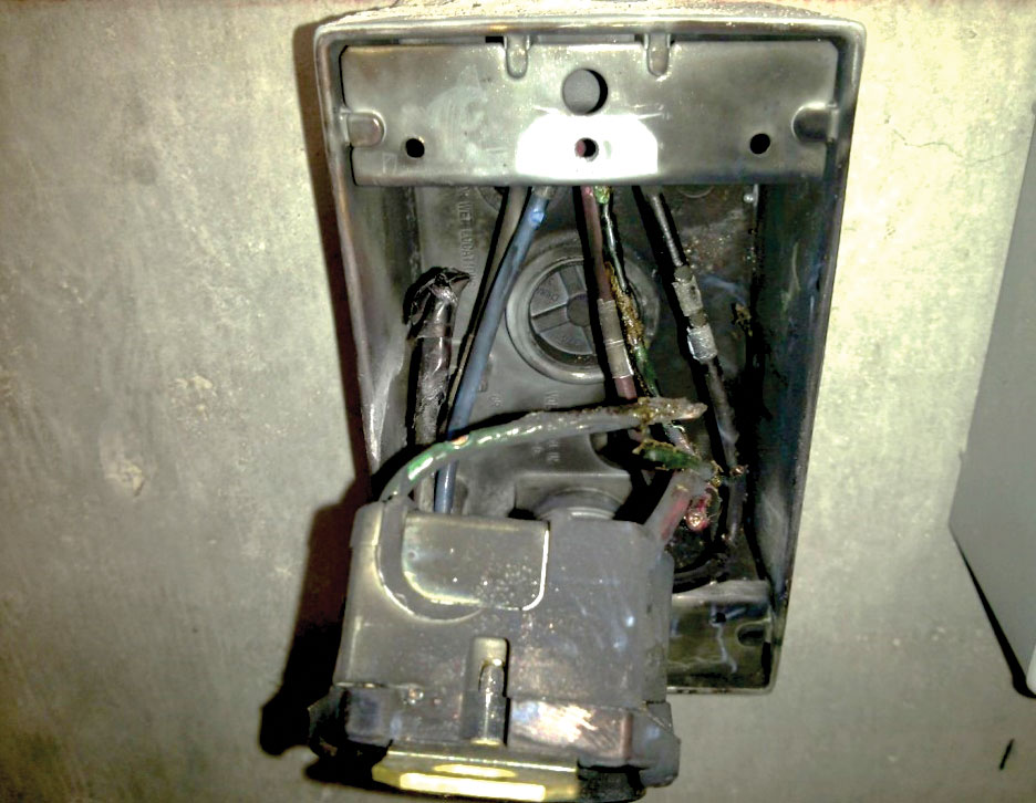 Image 4. Electrical arcing and damage in a 600-V electrical outlet from stray welding current.1