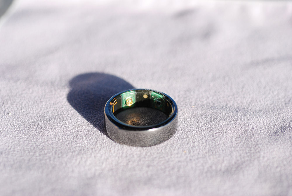 Photo 1. Biometric ring with accelerometer, pulse sensor, body temperature sensor, microprocessor, and Blutooth transceiver. Sensors can be seen on the inside surface.