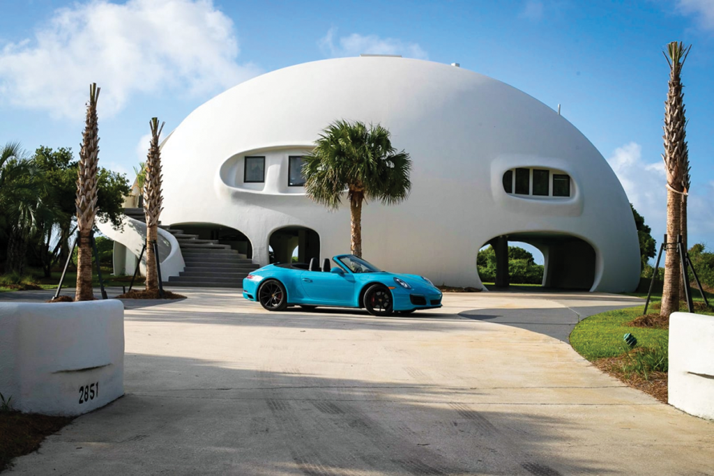 Nicknamed “Eye of the Storm,” this monolithic concrete home is resistant to high winds. (Image courtesy of Pareto Group.)