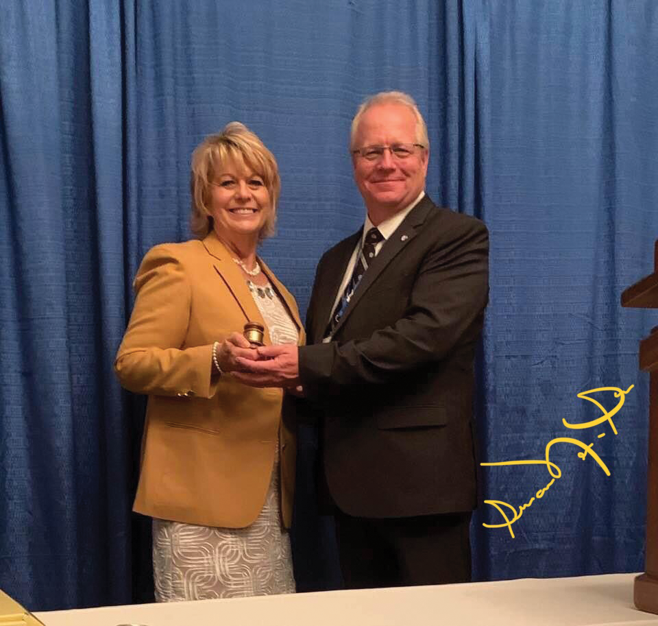 2019 IAEI International President presenting the gavel to new IAEI Southern Section President Susan Newman Scearce, who is also chair of CMP-6.