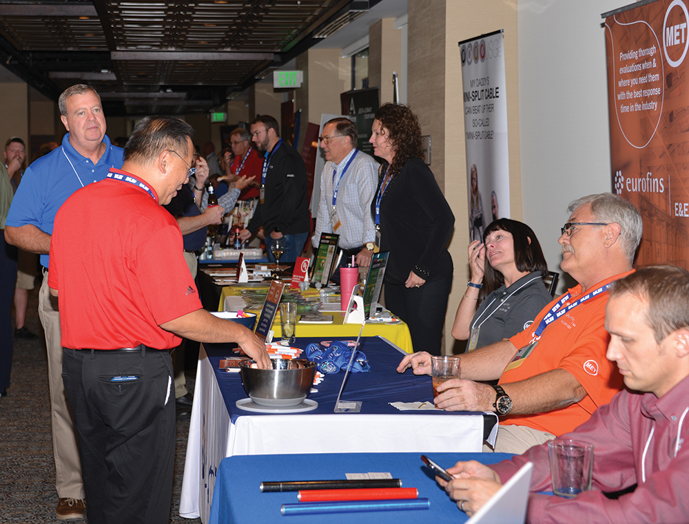 Every IAEI Section Meeting has vendor presentations to highlight the latest tools, techniques, and procedures within the electrical industry. Here attendees at the IAEI Eastern Section meeting ask questions and drop off cards for prize drawings at the evening banquet. 