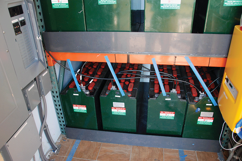 Photo 1.  Flooded, deep-cycle lead-acid batteries used in an off-grid home.  Courtesy of John Wiles