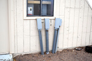 Photo 3. PVC conduits routed underground between buildings at a microgrid research facility. Courtesy of John Wiles