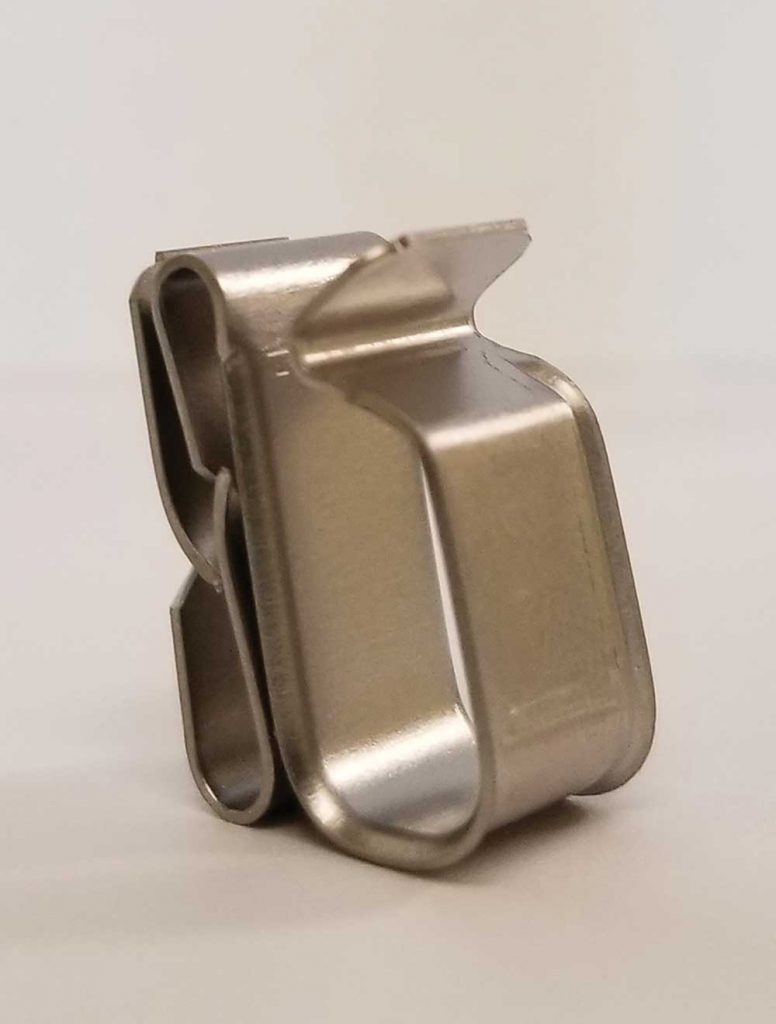 Photo 5. Stainless steel metal cable clip.  Note the rounded edges to minimize cable damage. Courtesy of Nine Fasteners Inc.