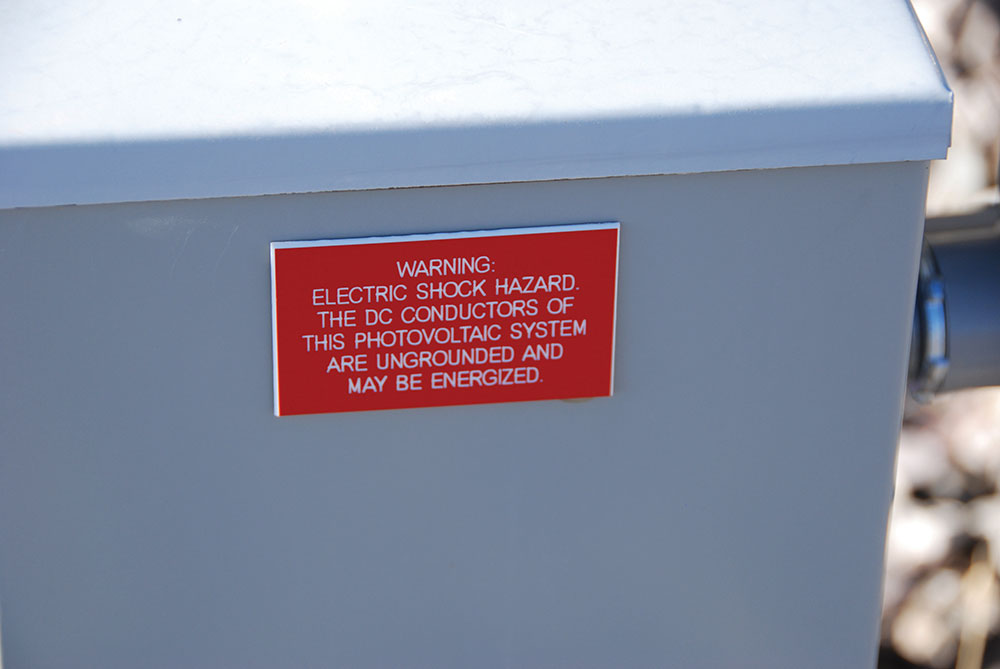 Photo 2. One of several required field-installed labels. Courtesy of John Wiles